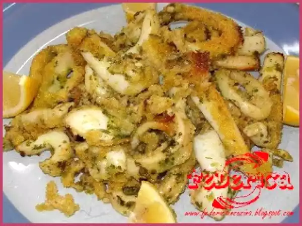 Ricetta Anelli di calamaro e seppie gratinati al forno