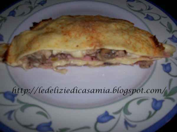 Ricetta Crepes ripiene con salsiccia e funghi....