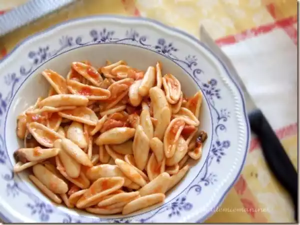 Ricetta Foglie d?ulivo pancetta e funghi.