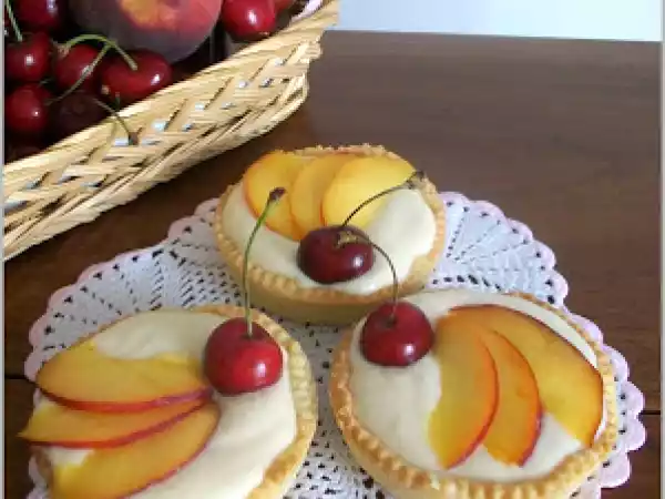 Ricetta Crostatine con mousse di ricotta e pesche