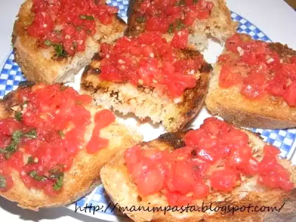 Ricetta Crostini piccanti pomodoro