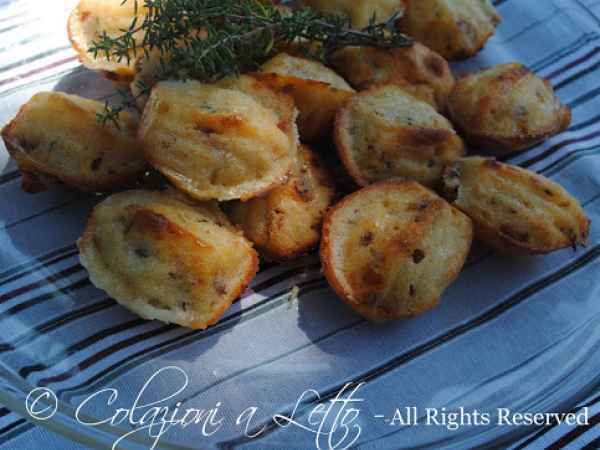 Ricetta Madeleine con pomodori secchi, caprino e timo