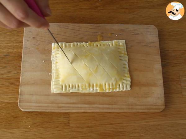 Fagottini di sfoglia con prosciutto e formaggio - Preparazione tappa 4