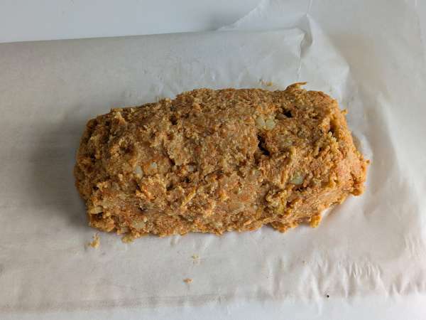 Polpettone di zucca con funghi e scamorza filante: ricetta gustosa e facile al forno - Preparazione tappa 10