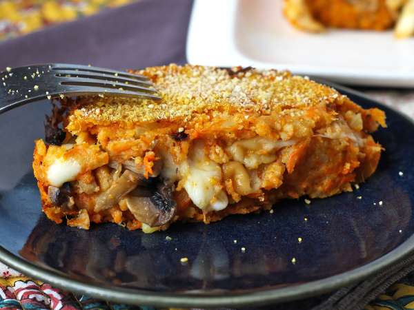 Polpettone di zucca con funghi e scamorza filante: ricetta gustosa e facile al forno - Preparazione tappa 14