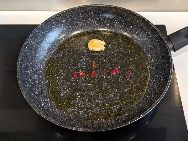 Sugo di calamari: un condimento perfetto per la pasta - Preparazione tappa 3