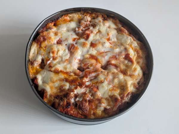 Timballo di rigatoni al forno con salsiccia, besciamella e mozzarella - Preparazione tappa 13