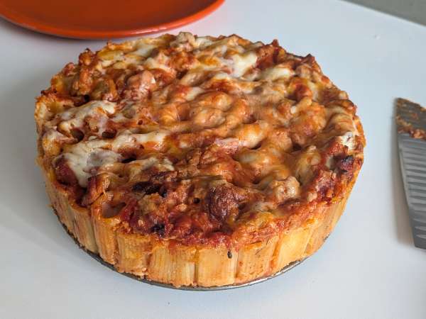 Timballo di rigatoni al forno con salsiccia, besciamella e mozzarella - Preparazione tappa 14