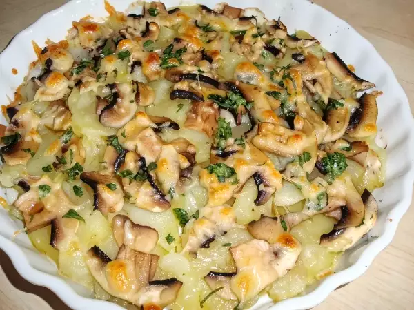 Tortino di patate e funghi al forno con mozzarella: ricetta facile e gustosa - Preparazione tappa 4