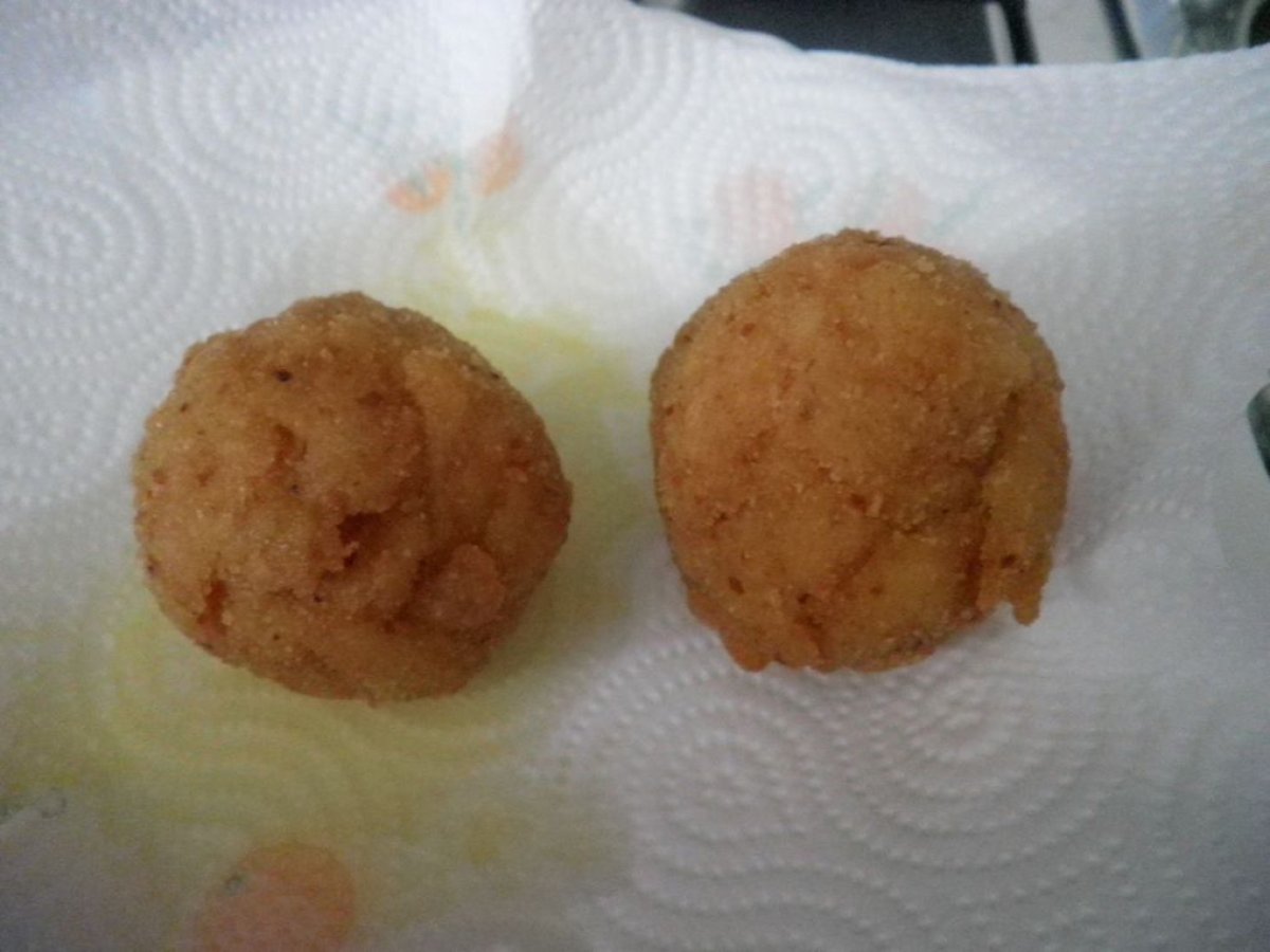 Arancini di riciclo di penna al pomodoro con mortadella