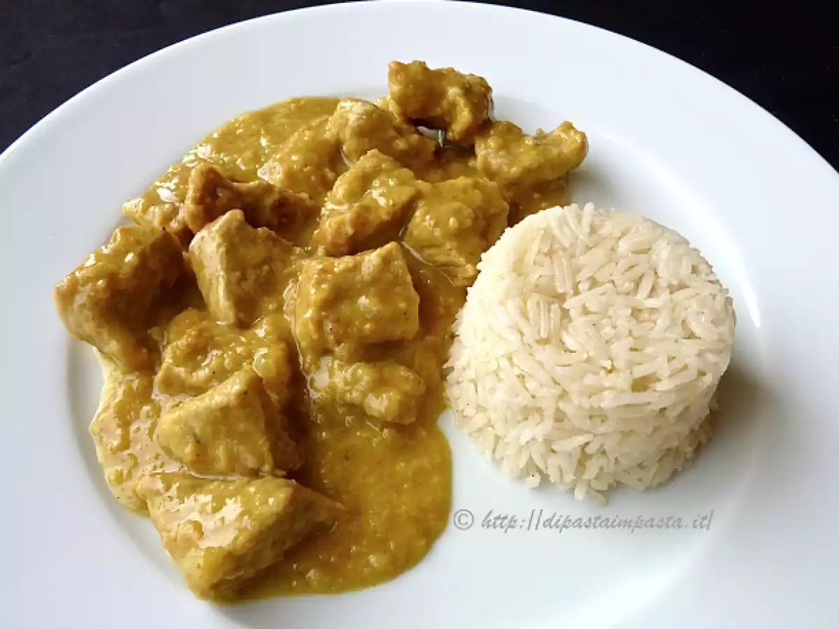 Bocconcini di vitello al curry e riso pilaf