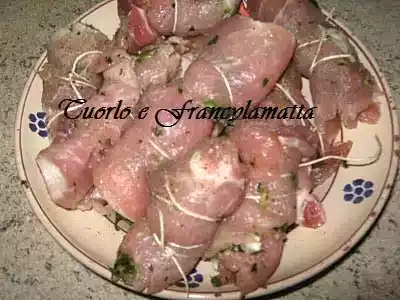 Braciole di maiale sotto grasso