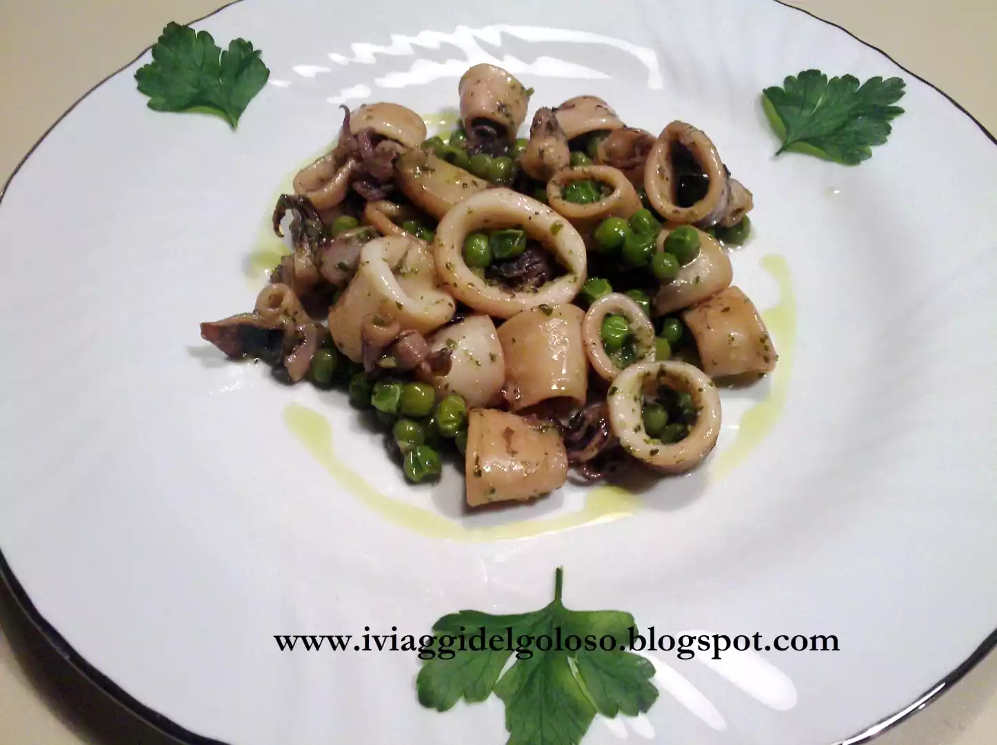 Calamari al verde con piselli