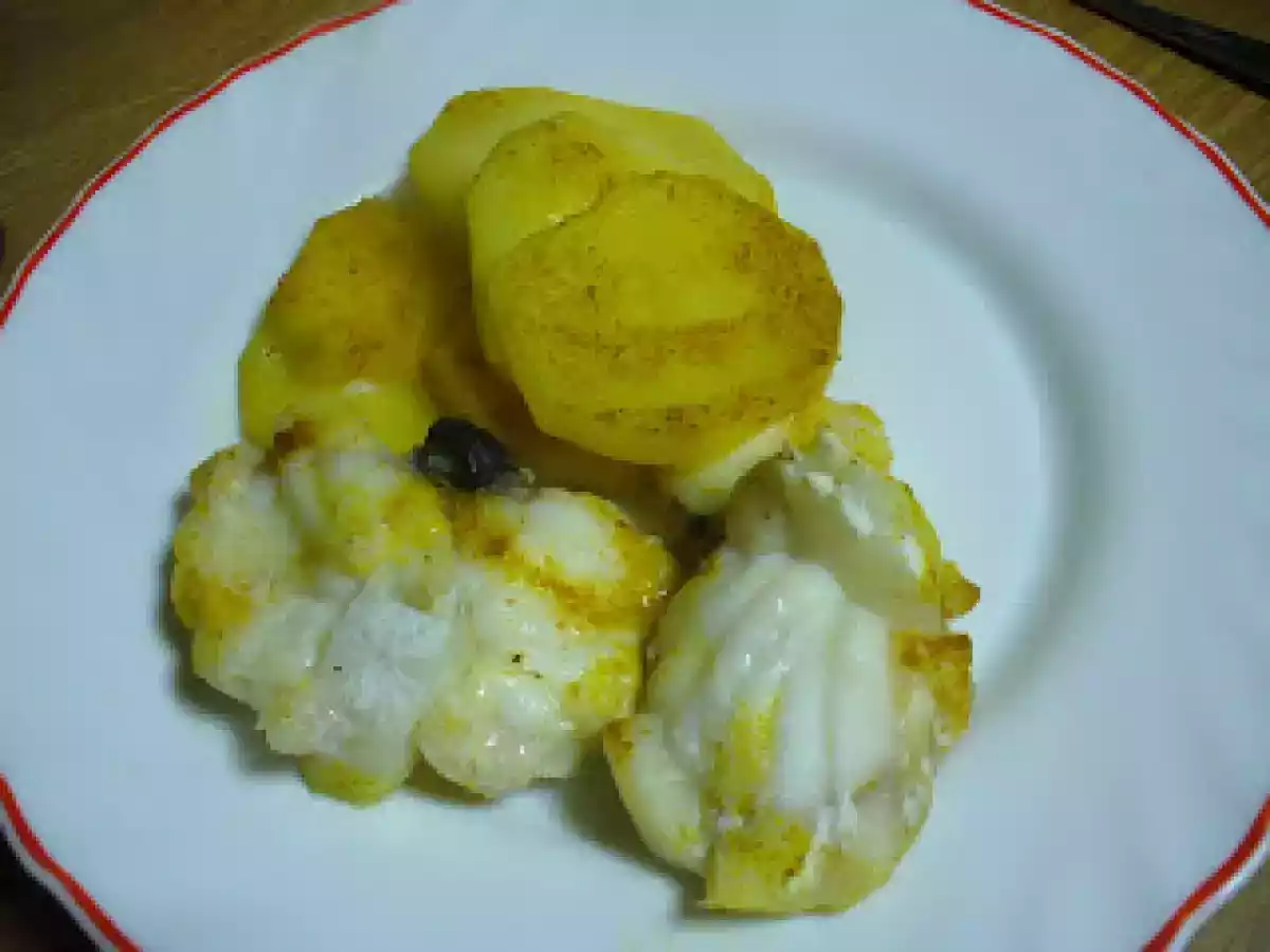 Coda di rospo al cartoccio con patate e curry