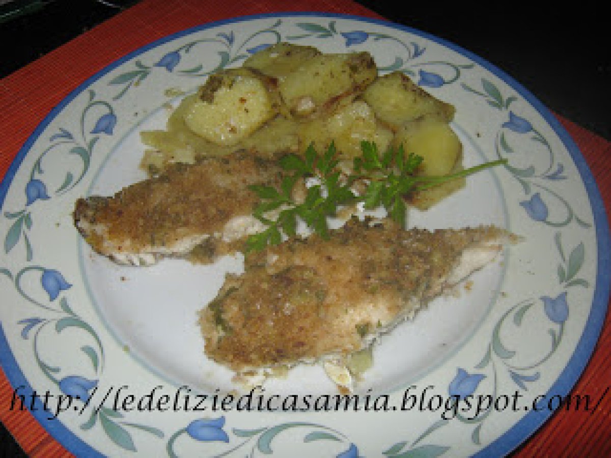 Filetti di Ricciola con panatura aromatica sul letto di patate