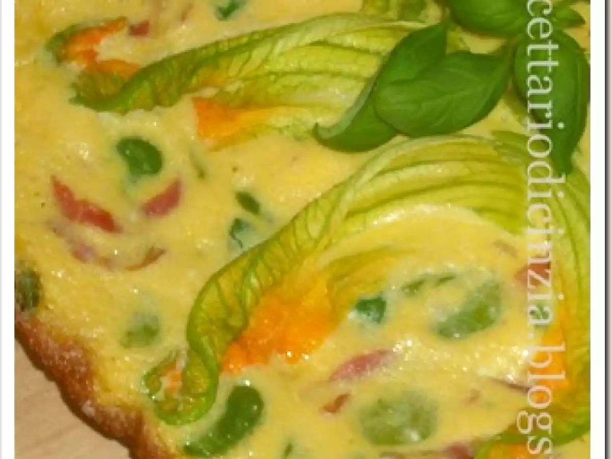 Frittata con fave speck e fiori di zucchina