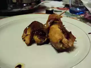 Involtini di tacchino con pancetta e prugne