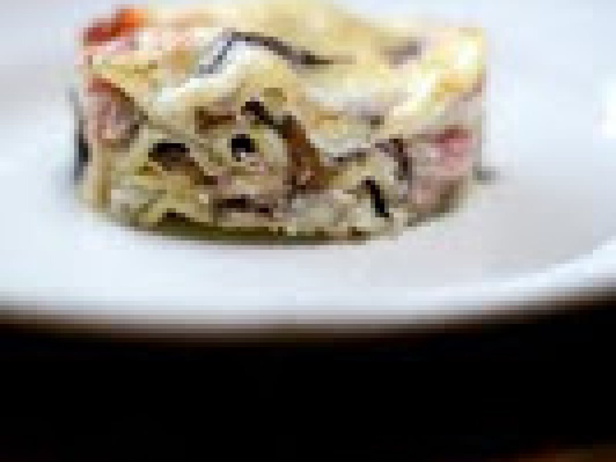 Lasagne con funghi e prosciutto cotto