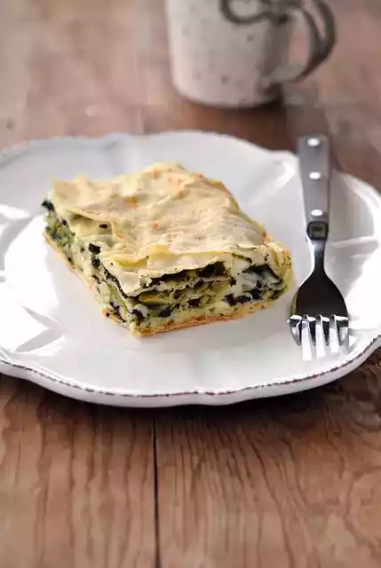 Lasagne di pane carasau con cavolo nero e stracchino