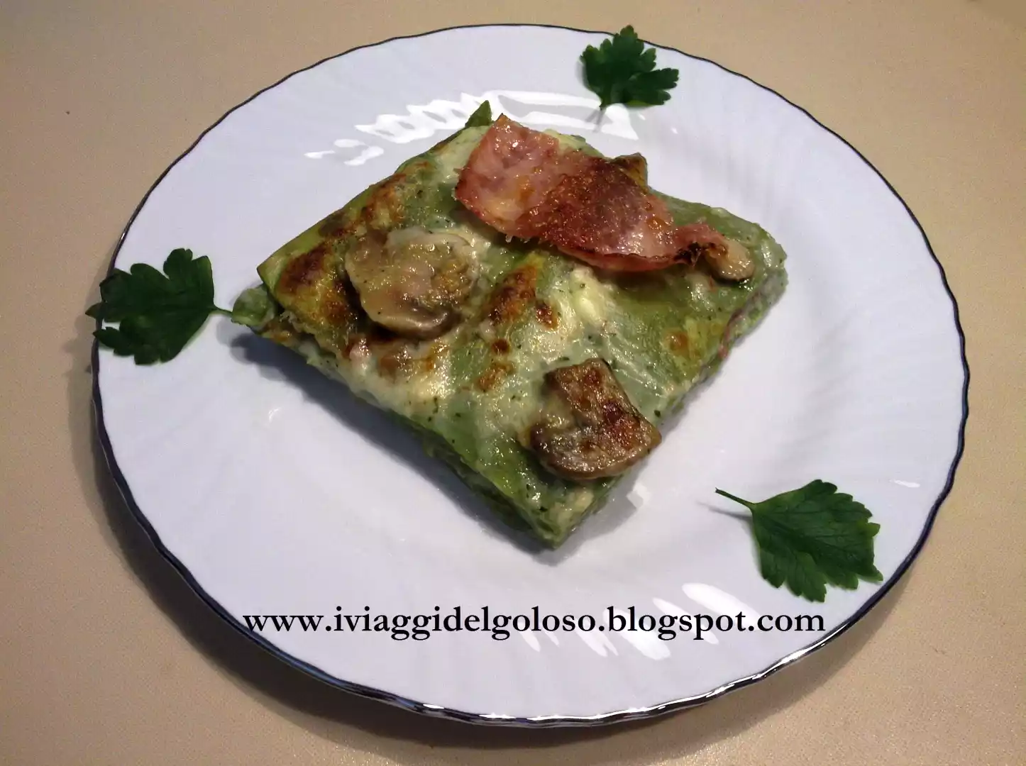 Lasagne verdi con prosciutto e funghi