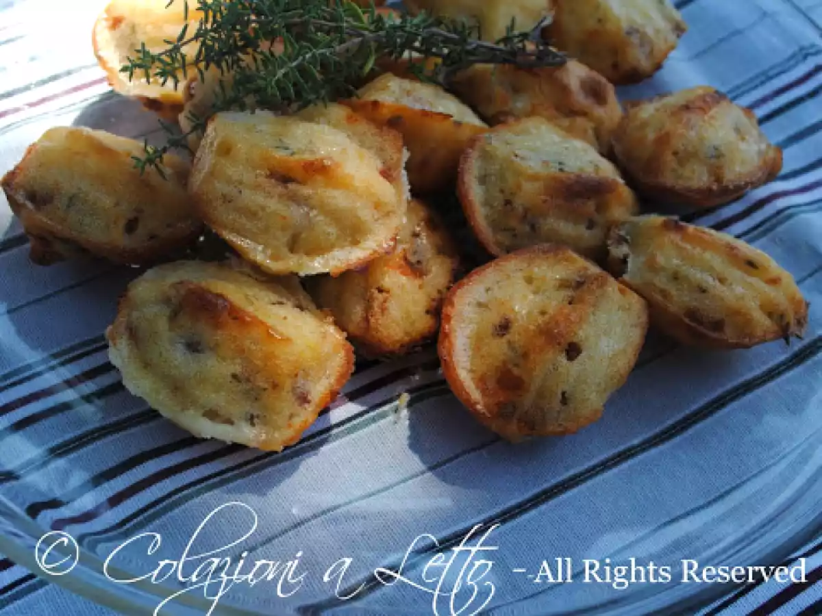 Madeleine con pomodori secchi, caprino e timo