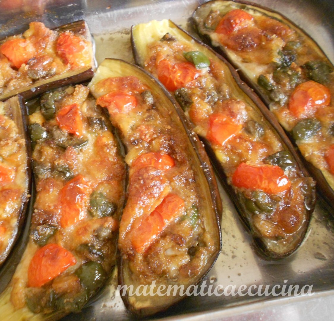 Melanzane spaccate ovvero melanzane imbottite al forno Ricetta Petitchef