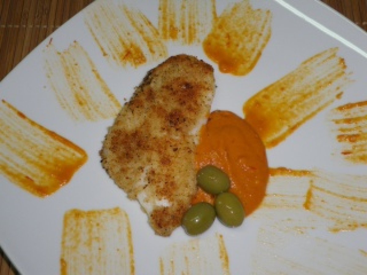 MERLUZZO IMPANATO CON SALSA ALLA PIZZAIOLA