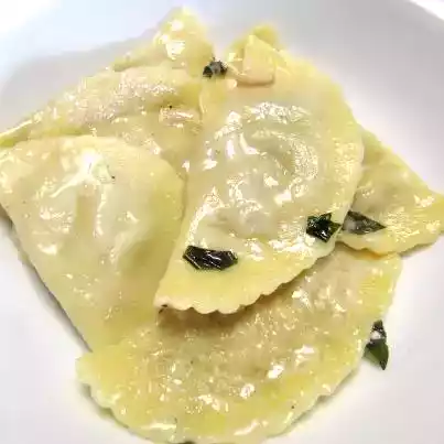 Mezzelune ripiene di funghi e ricotta
