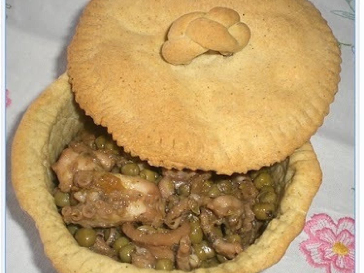 Moscardini con piselli in cocotte
