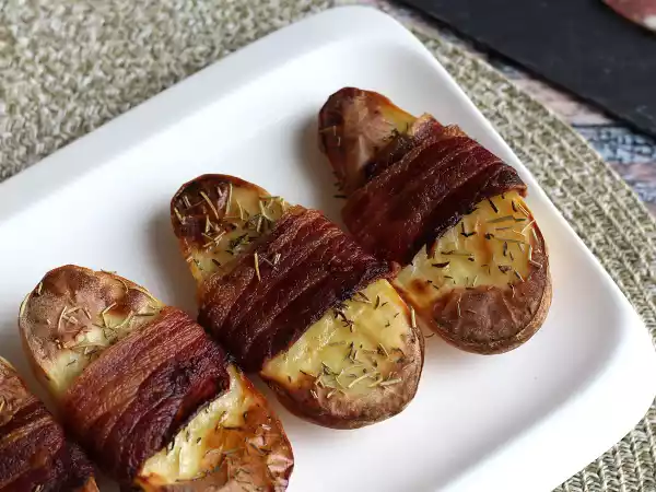 Ricetta Patate al forno con pancetta affumicata