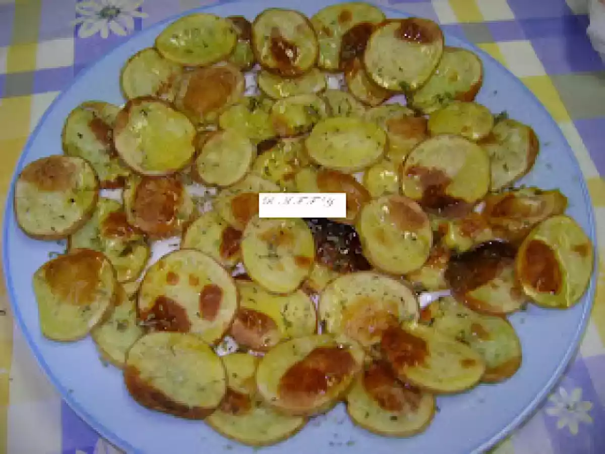 PATATE ARROSTITE CON BUCCIA