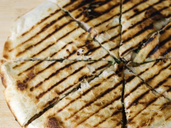 Piadina con funghi e spinaci