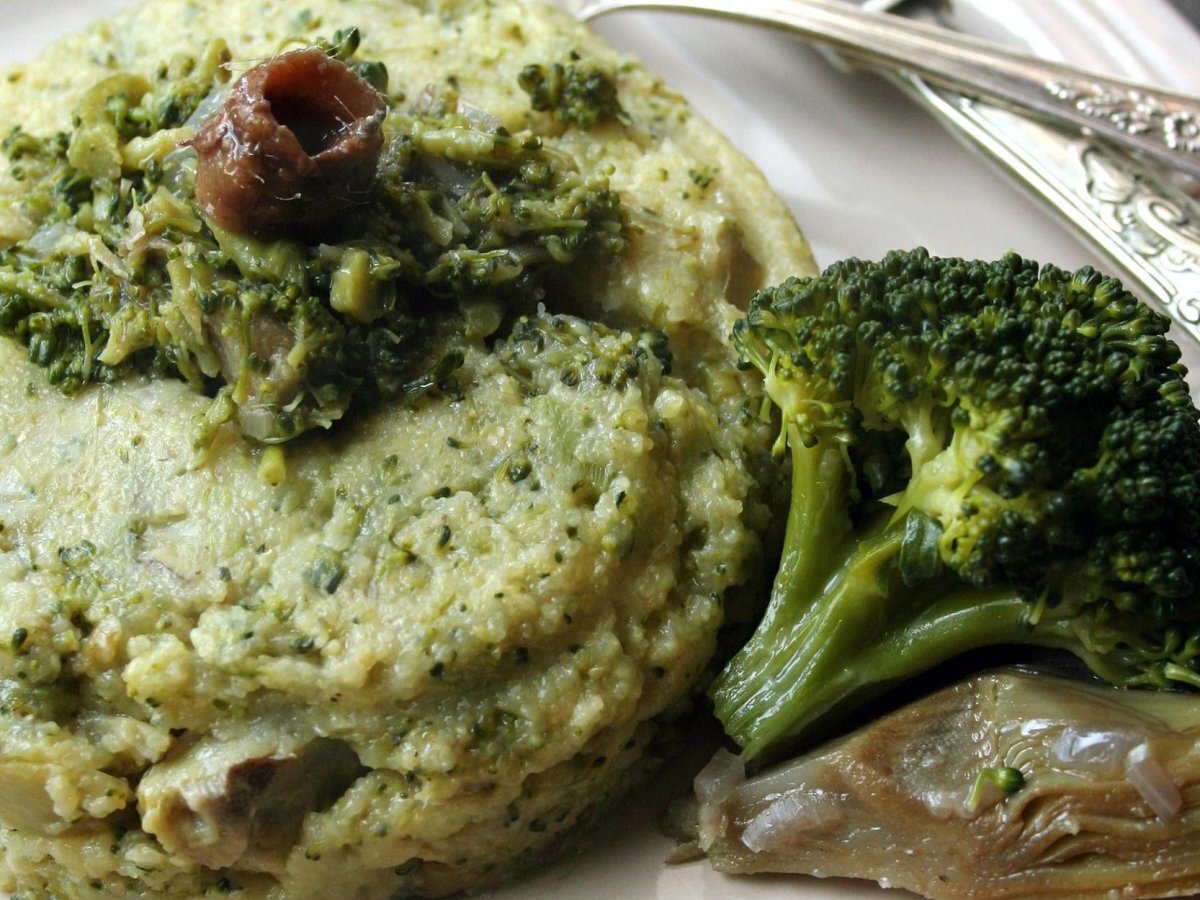 Polenta broccoli, carciofi e acciughe