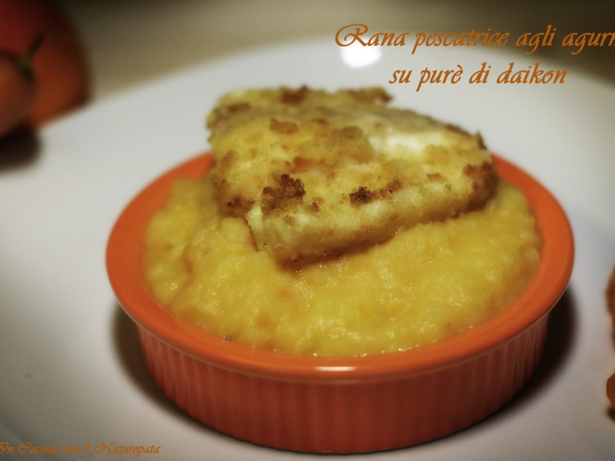 Rana pescatrice in panatura agli agrumi su purè di daikon e carote all’arancia