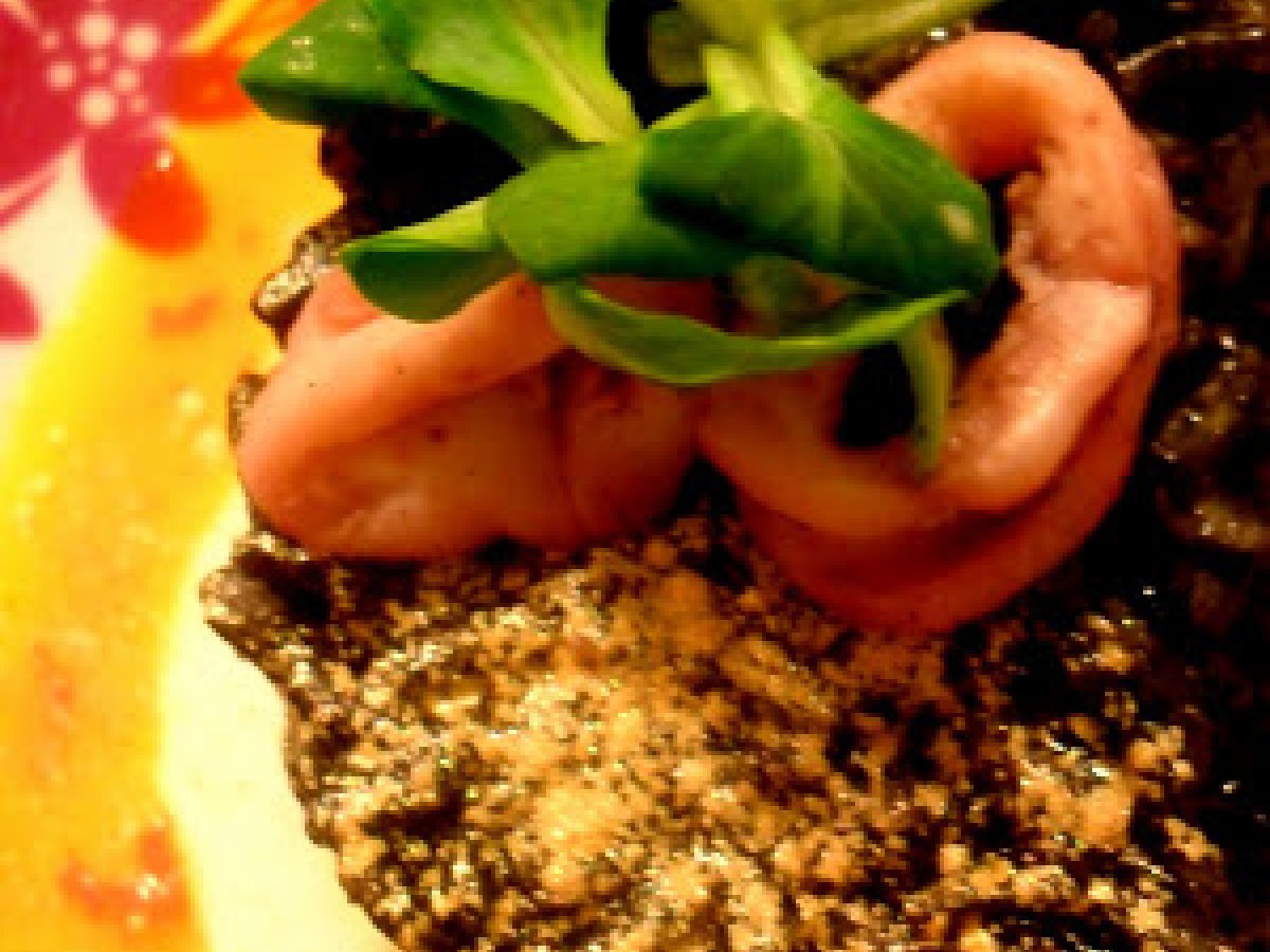 Riso al nero con salsa al mango e calamari
