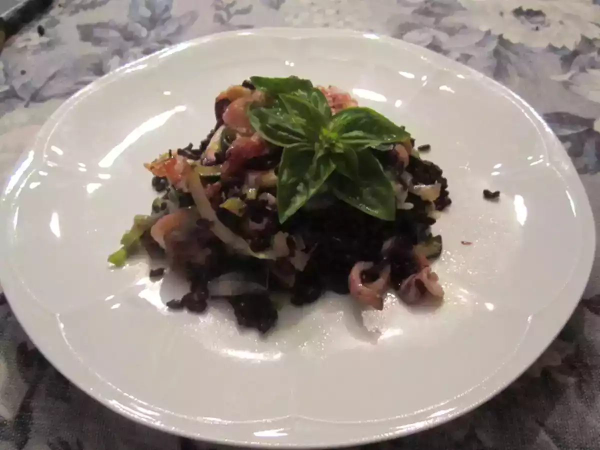 Riso venere con polpo, pancetta e zucchine alla menta