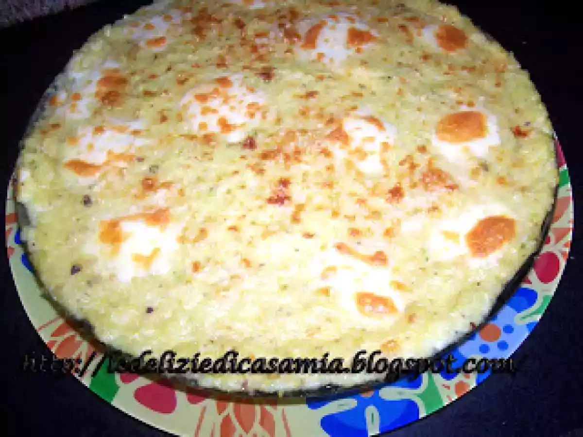 Risotto ai pistacchi mantecato alla besciamella e infornato