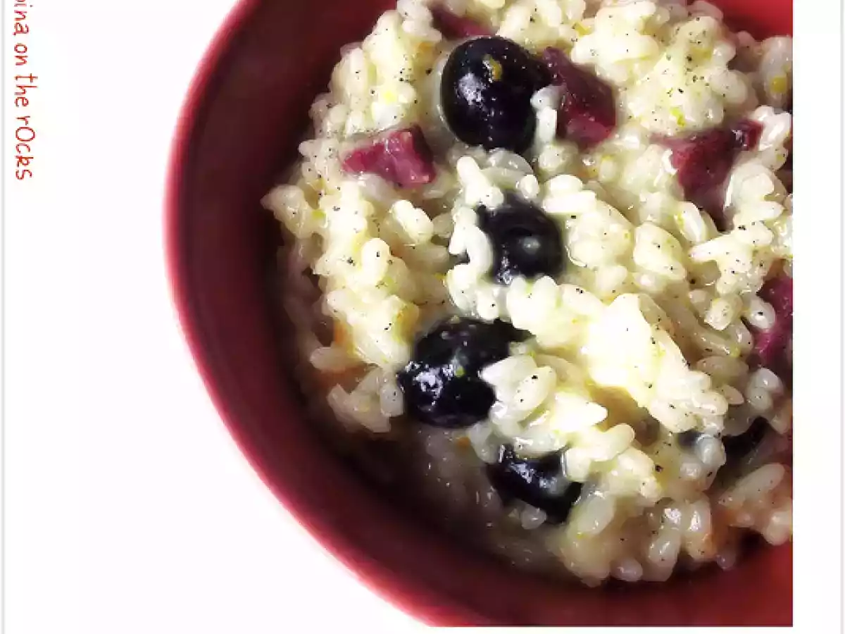 Risotto all'arancia con bresaola, taleggio e olive nere
