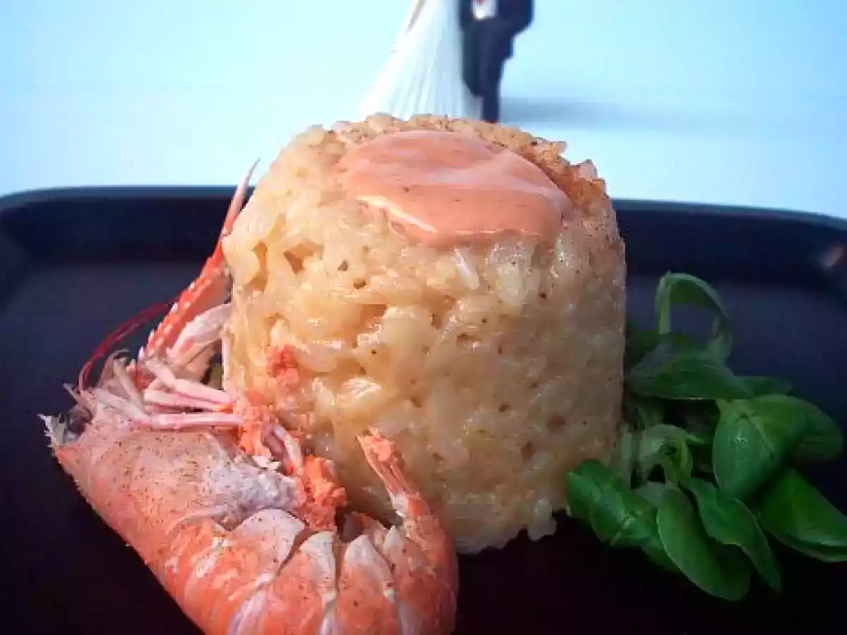 Risotto alla crema di scampi sfumato al brandy
