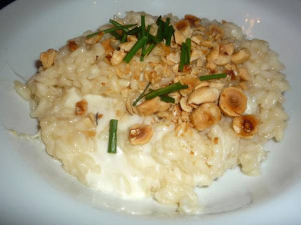 Risotto mantecato con crescenza e nocciole