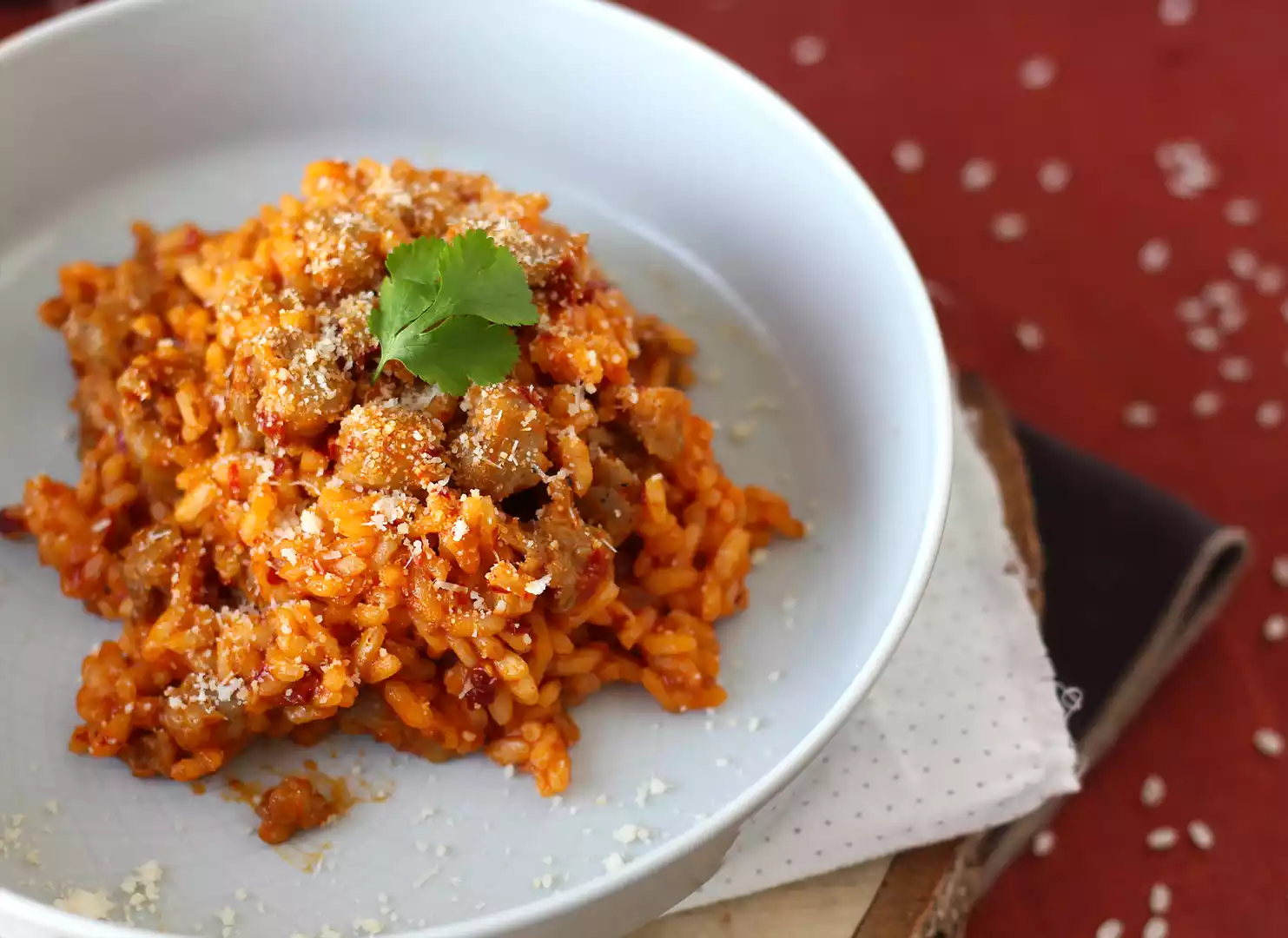 Risotto 'nduja e salsiccia, un primo piatto dal gusto intenso