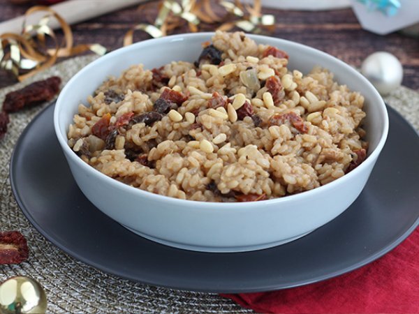 Risotto vegetariano con funghi e pomodori secchi