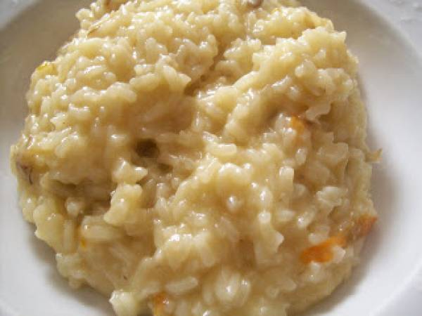 Risotto zafferano, carciofi, fiori di zucca e premio