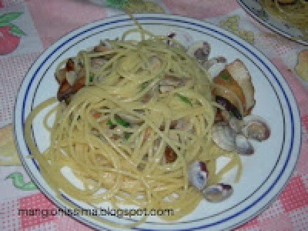 Spaghetti con vongole veraci e funghi porcini