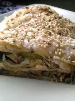 Strudel di parmigiana con feta e zucchine
