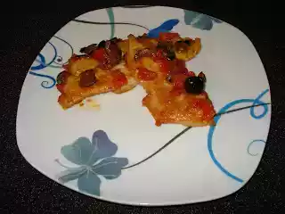 Tacchino con pomodorini e olive nere