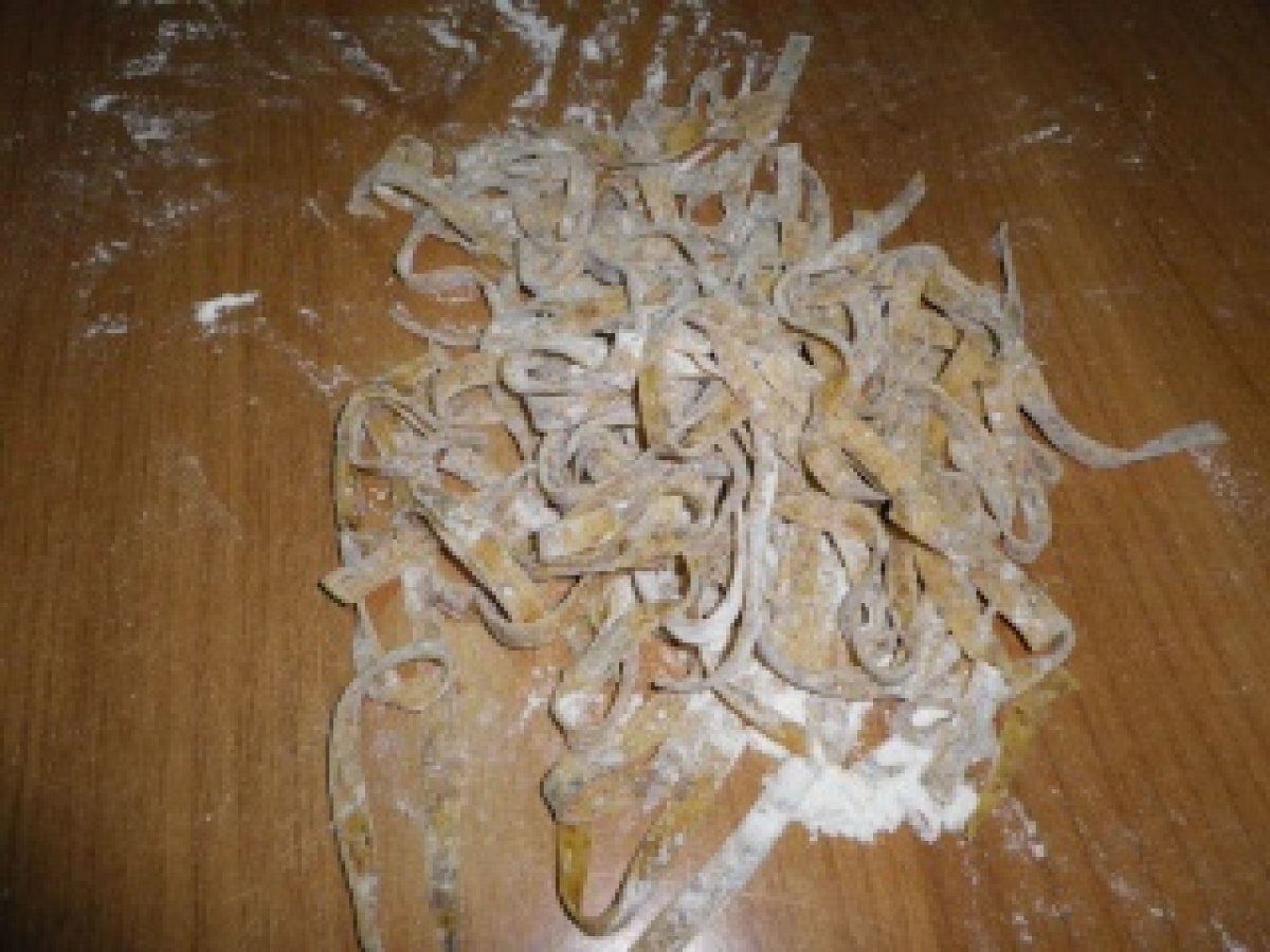 TAGLIATELLE AI FUNGHI CON SALSICCIA RADICCHIO E NOCI, foto 11