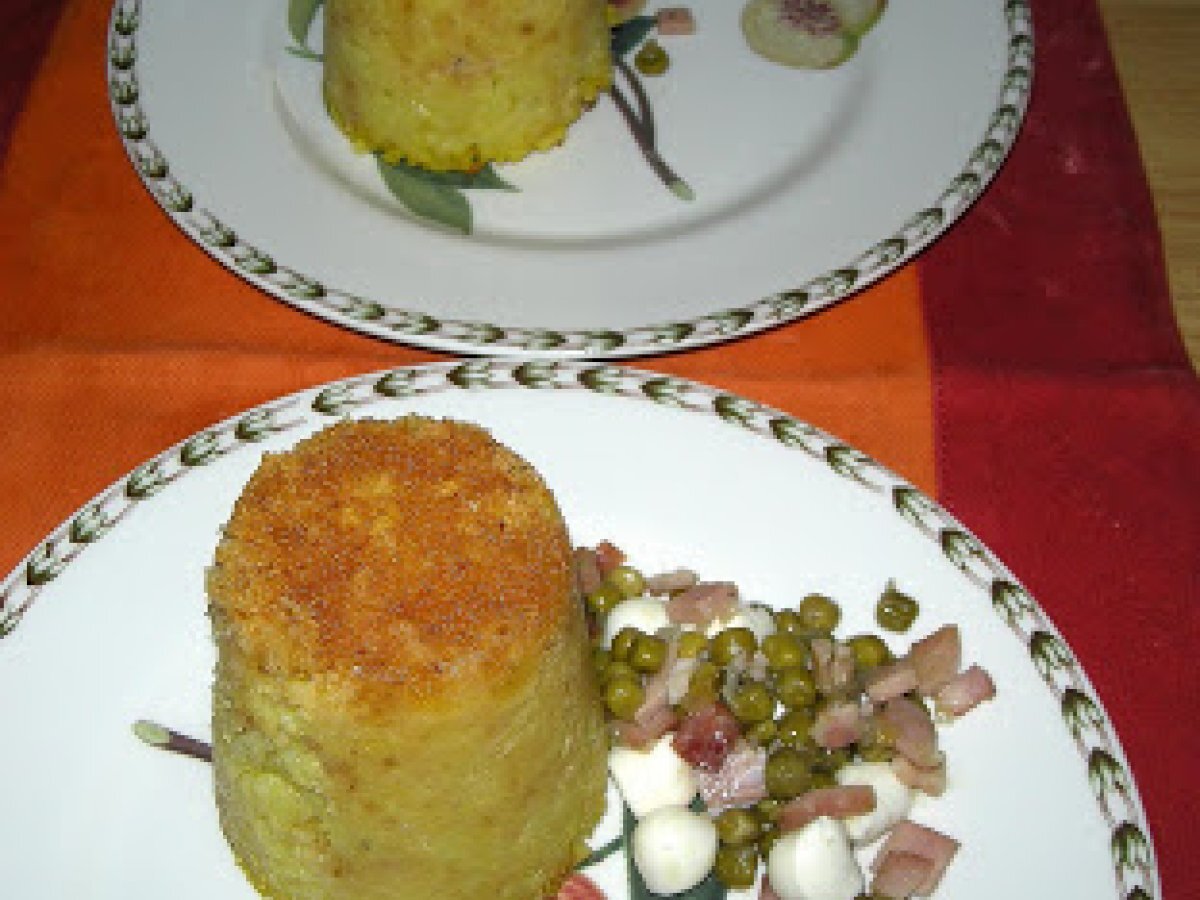 Timballini di riso con prosciutto e piselli