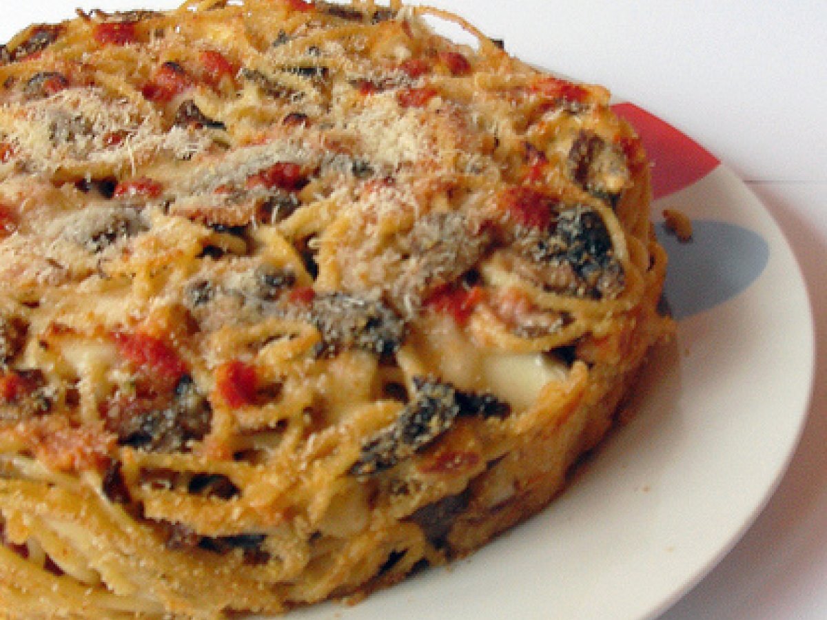 Timballo di spaghetti con funghi