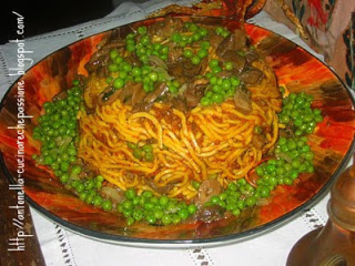 Timballo di tagliolini ai funghi porcini e piselli